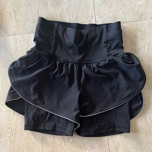 Lululemon black high waisted bike shorts with track shorts over them size 6
